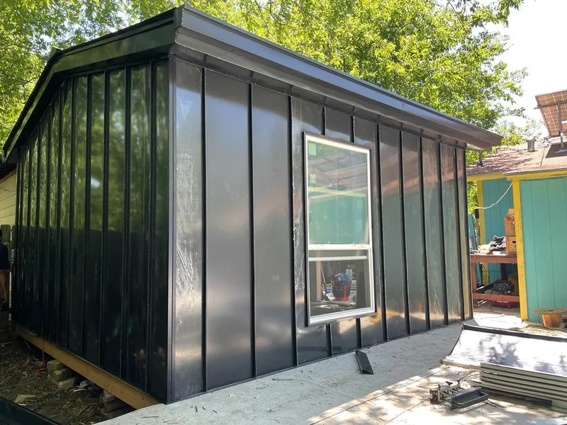 Black standing seam metal wall panels for Metal Roof Installation in Vernon